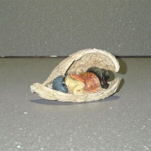 Sleeping Figurine in Angel Wing